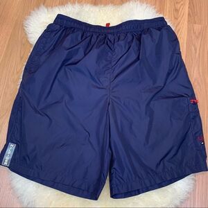 Tommy Hilfiger navy swim trunks with zip pockets